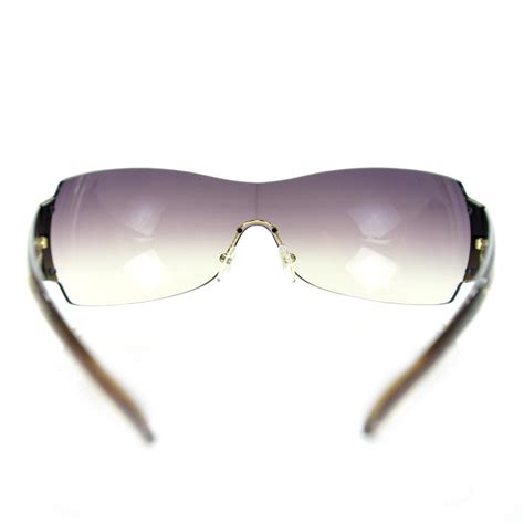 PRADA Tortoise Shell Sunglasses SPR 54G.